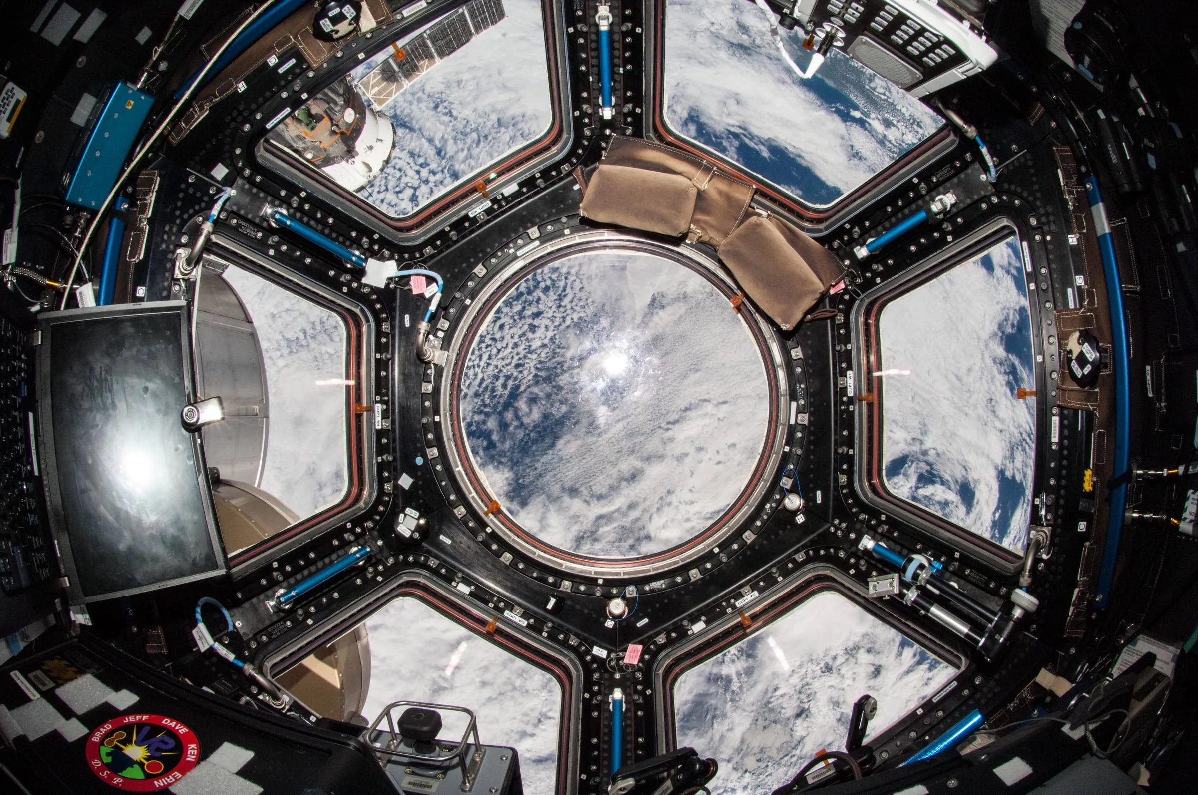 Earth seen through the seven windows of the International Space Station's Cupola.