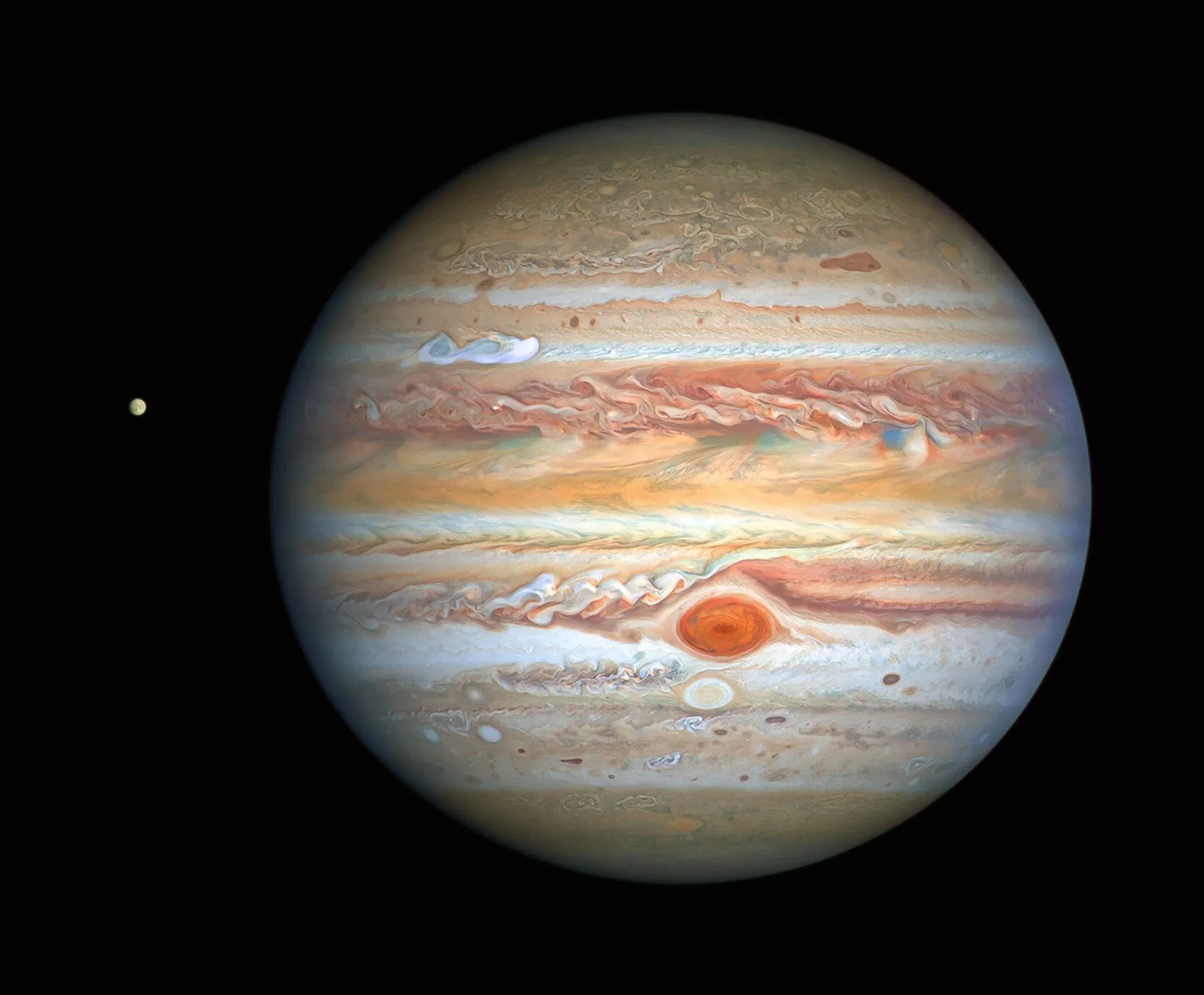 Jupiter with its moon Europa beside it.