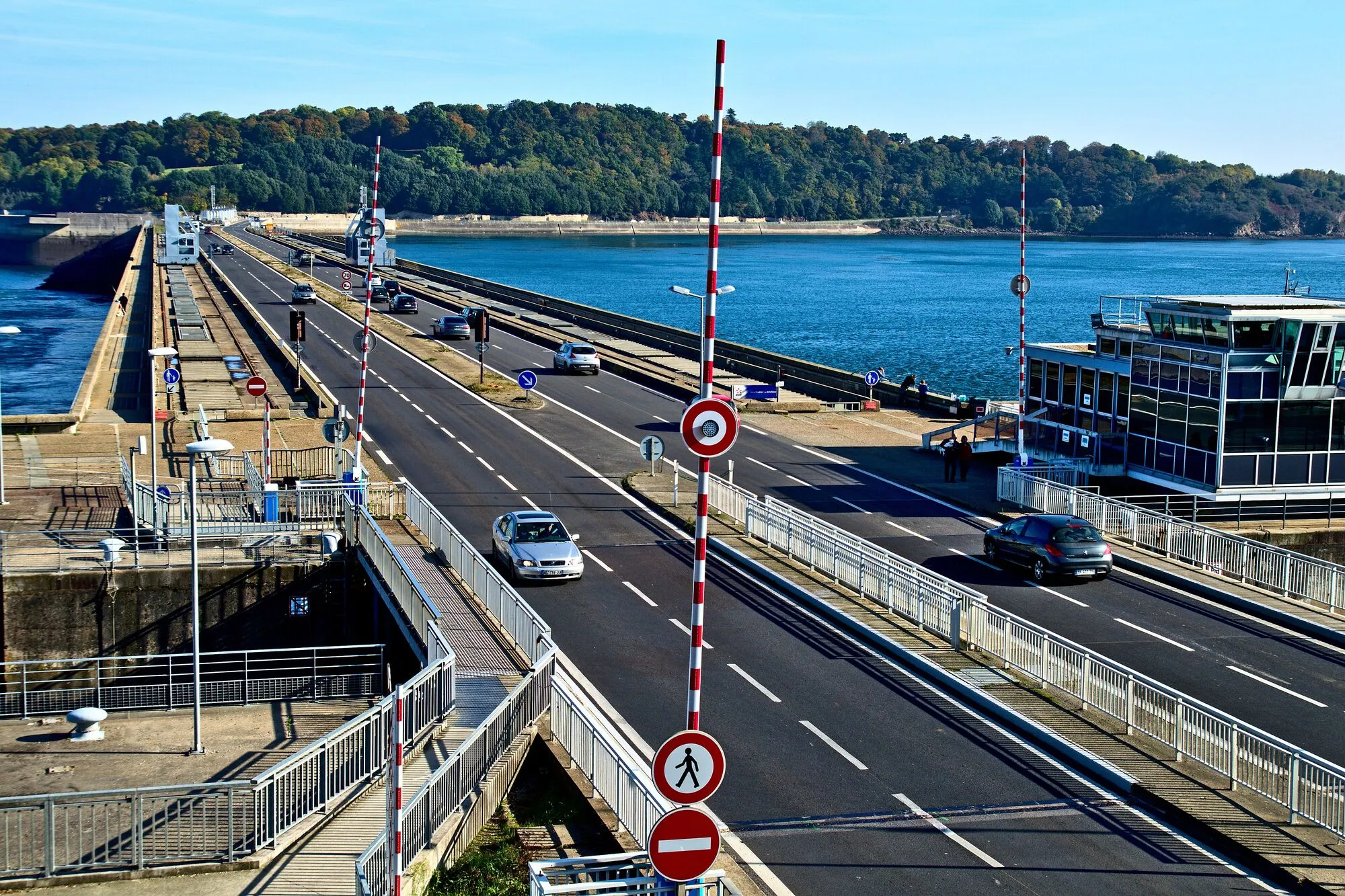 The Rance tidal barrage near Saint-Malo, with a road on top, the estuary on one side and the sea on the other.